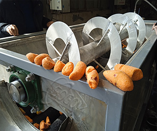 Cassava peeling machine